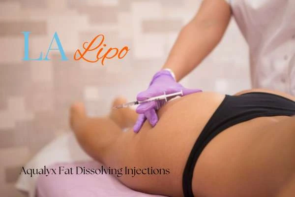 Woman having fat dissolving injections Kingstanding on thighs